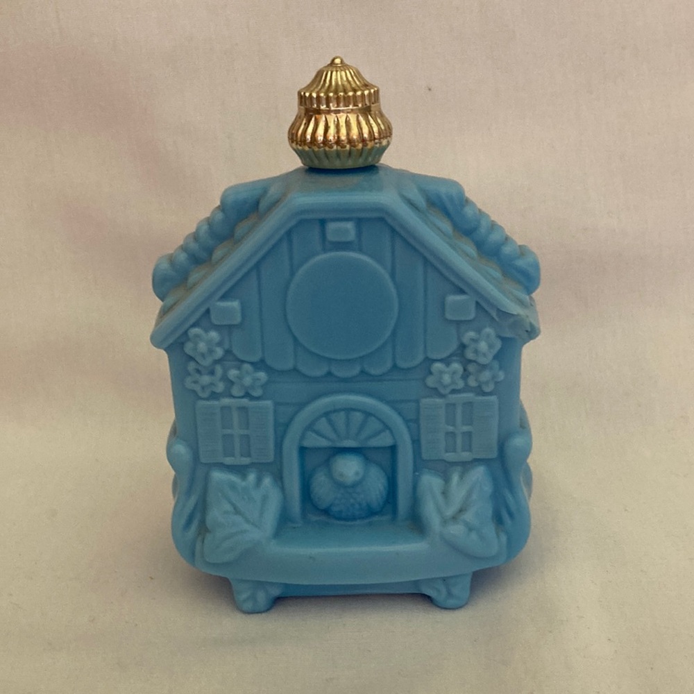 Avon collectables Blue milk glass cologne bottle